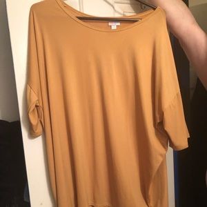 Yellow lularoe Irma top. Pet friendly home